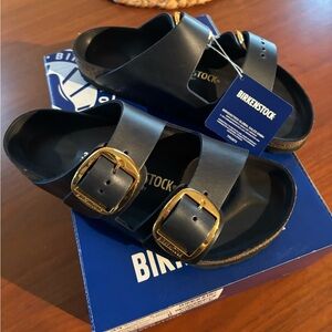 Womens Birkenstocks navy gold buckle